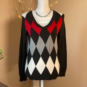 Lizgolf brand v-neck line sweater, size Medium.